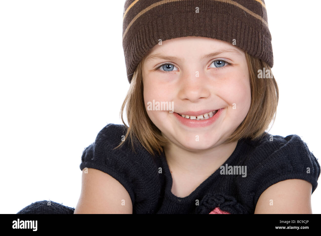 Close Up Shot of a Pretty Child with Big Blue Eyes Stock Photo