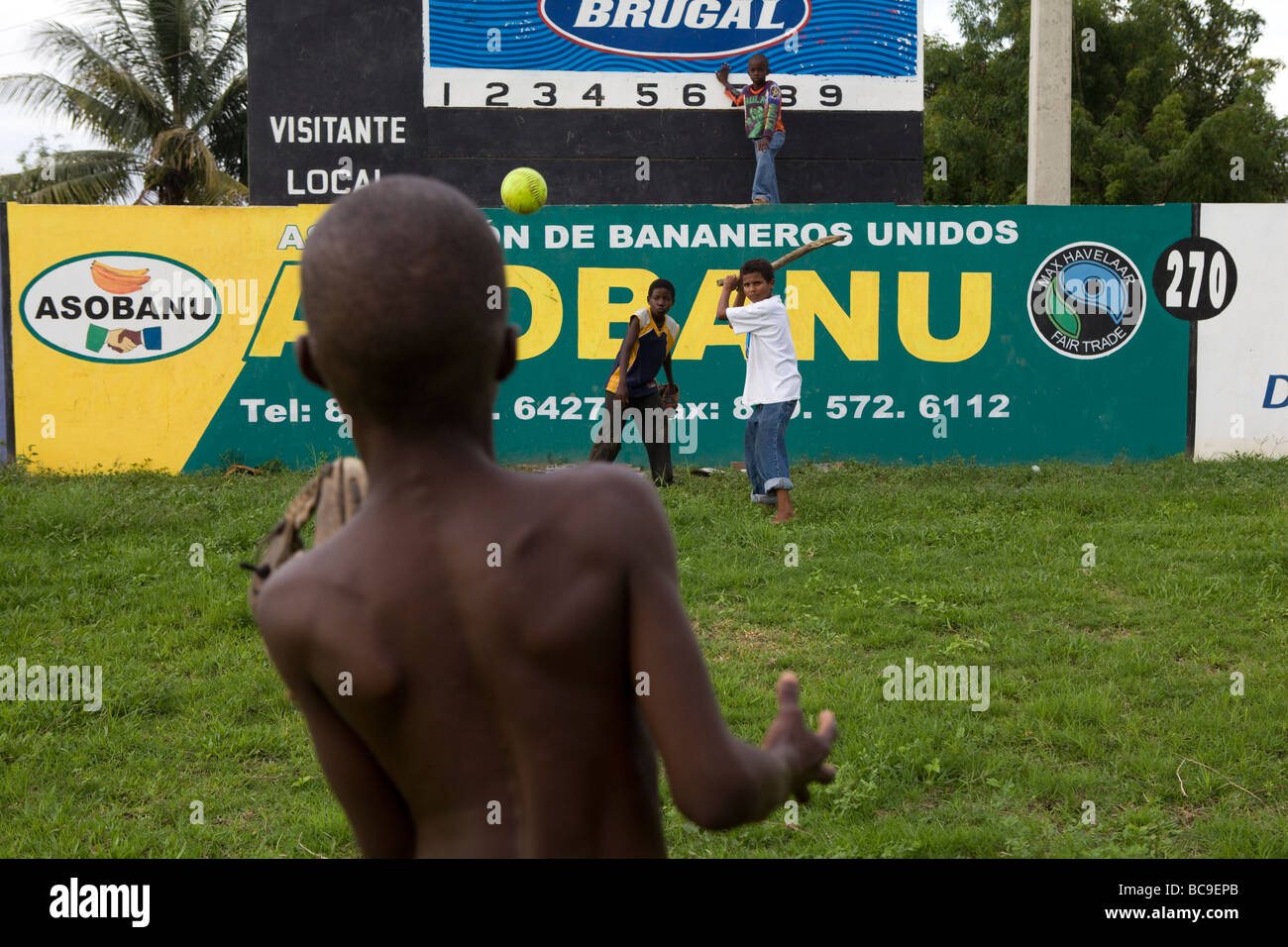Boys playing baseball in the Dominican Republic Stock Photo