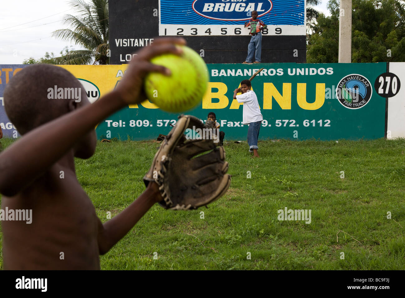 Boys playing baseball in the Dominican Republic Stock Photo
