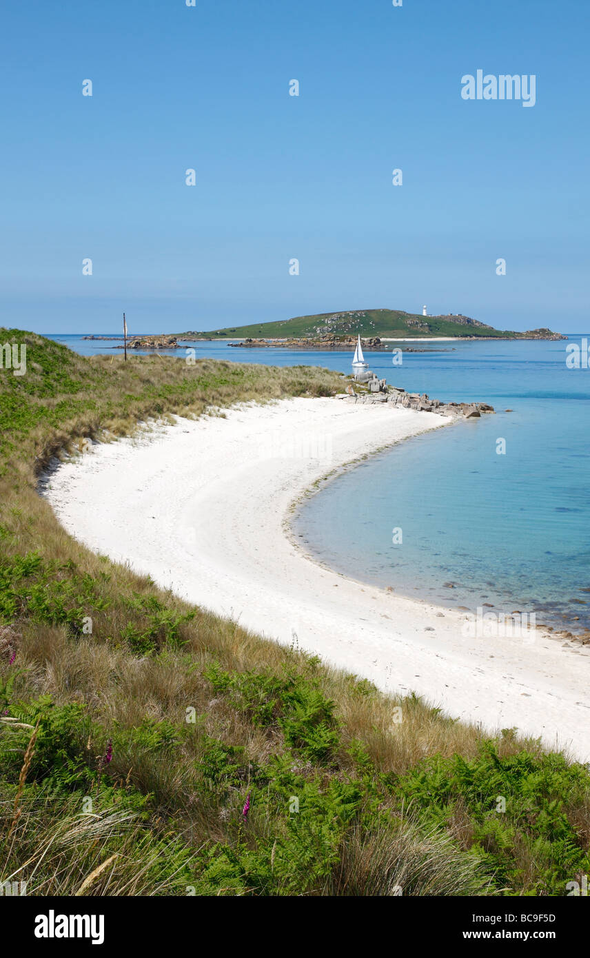 A beautiful white sandy beach and turquoise sea, Tresco Isles of Scilly, Cornwall UK. Stock Photo