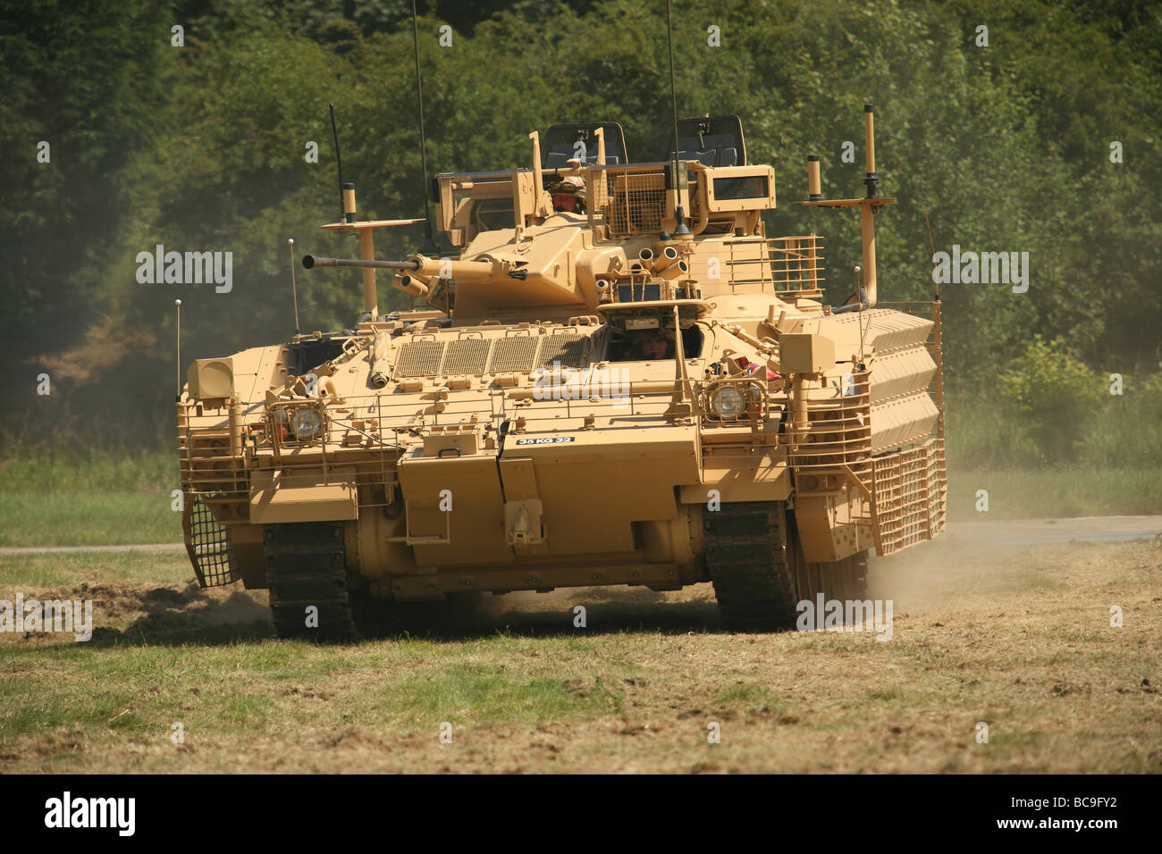 warrior armoured carrier and tank on display at British military event Stock Photo