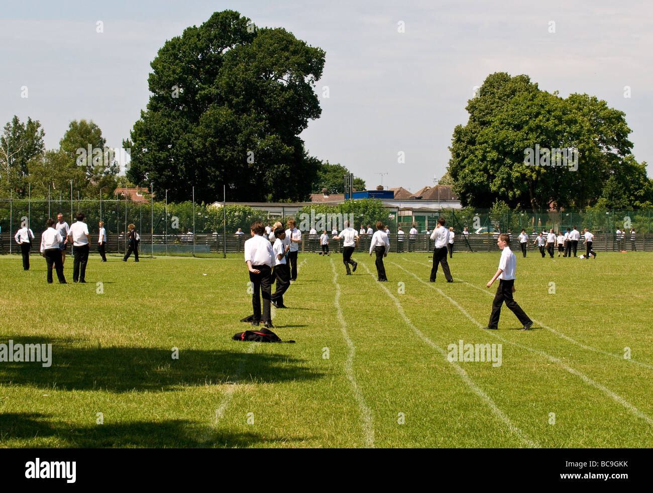Students pupils on a school playing field. Stock Photo