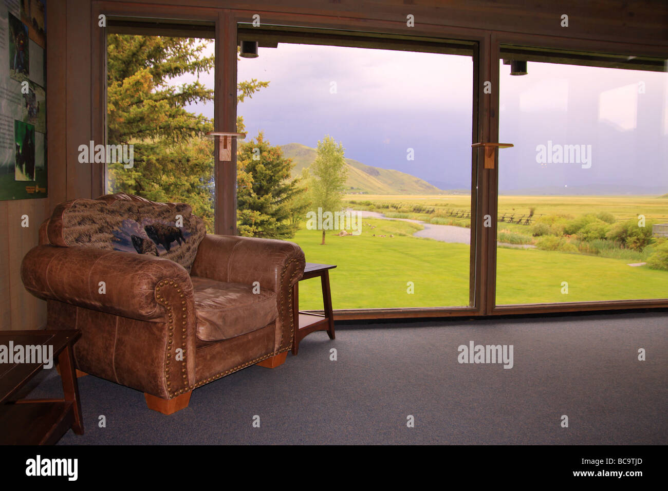 a comfortable chair with a view of the National elk refuge from the visitor center at jackson hole, wyoming Stock Photo