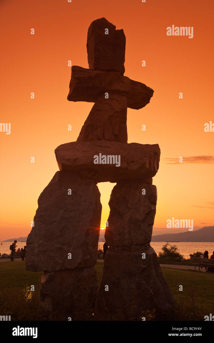 The Inukshuk monument in sunset park at English bay Olympic Symbol Westend Vancouver City Canada North America Stock Photo