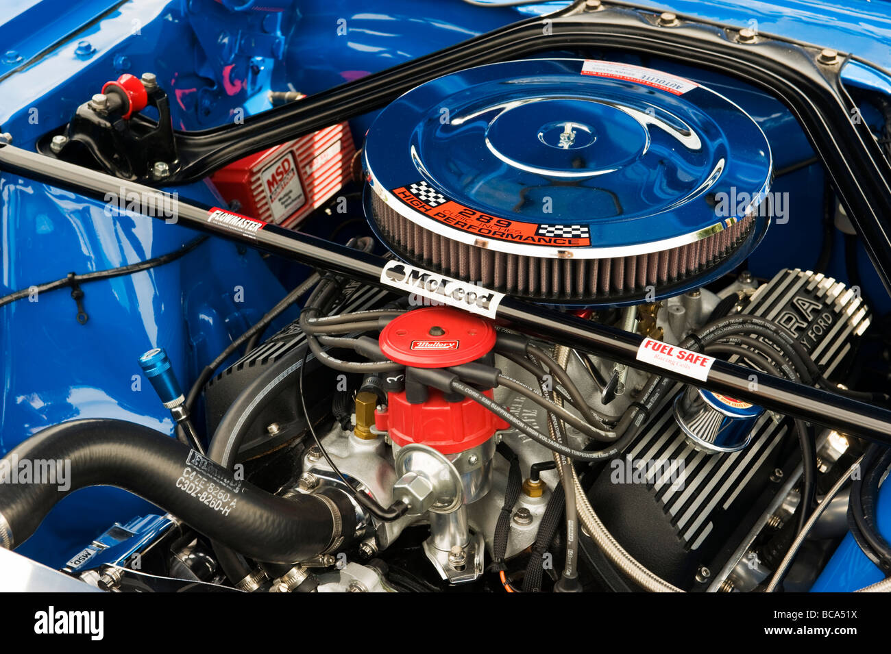a car engine compartment an exhibit at Hedsor Classic car show in
