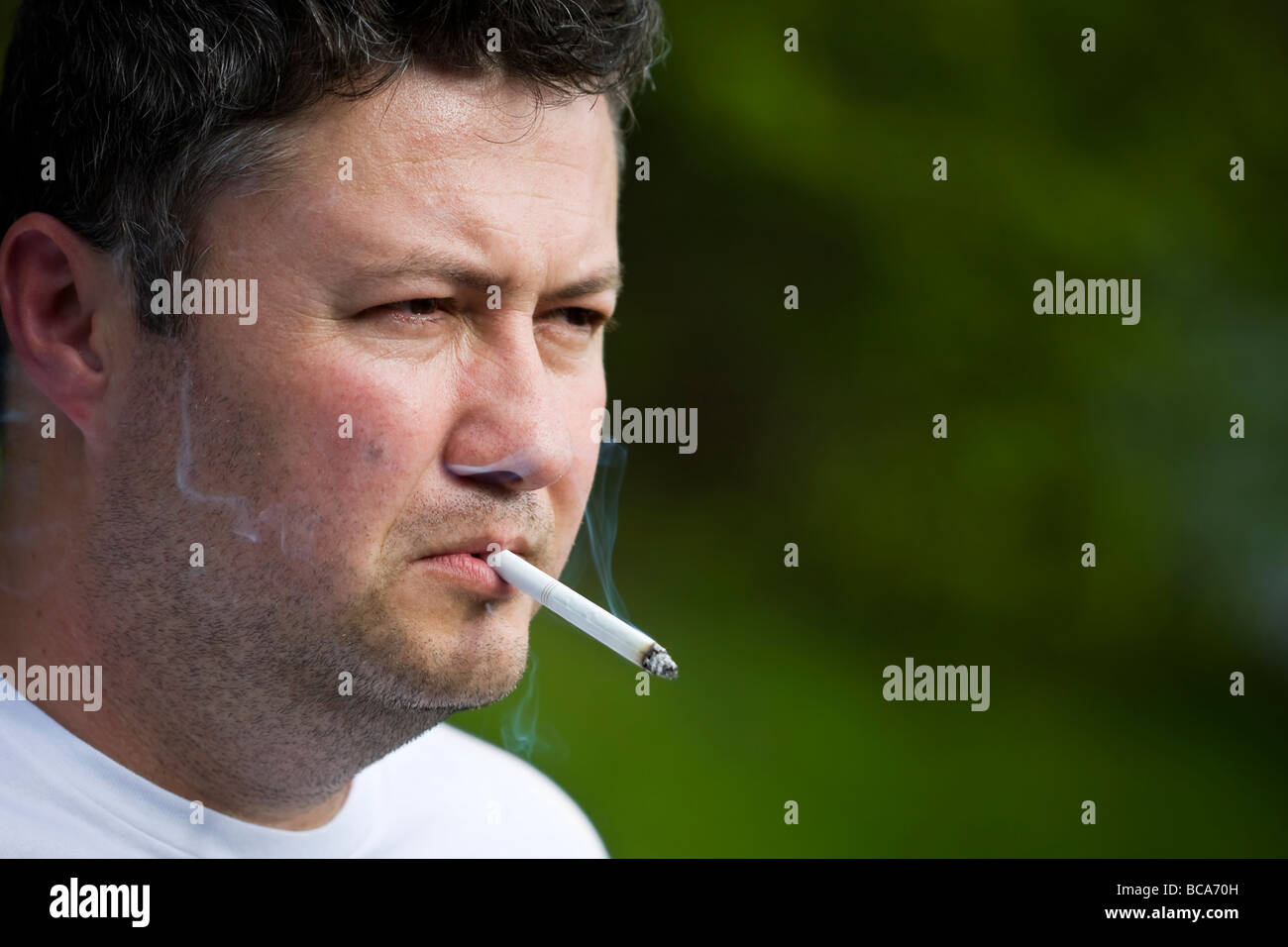 Smoking man Stock Photo