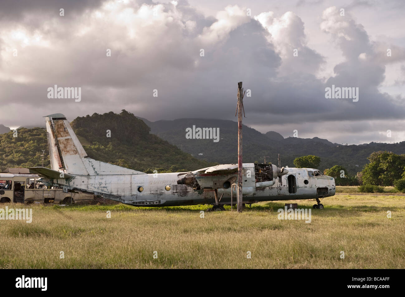 Abandonned old Russian built airplane operated by the Cubian military  at the disused Pearl's Airport in Grenada Stock Photo