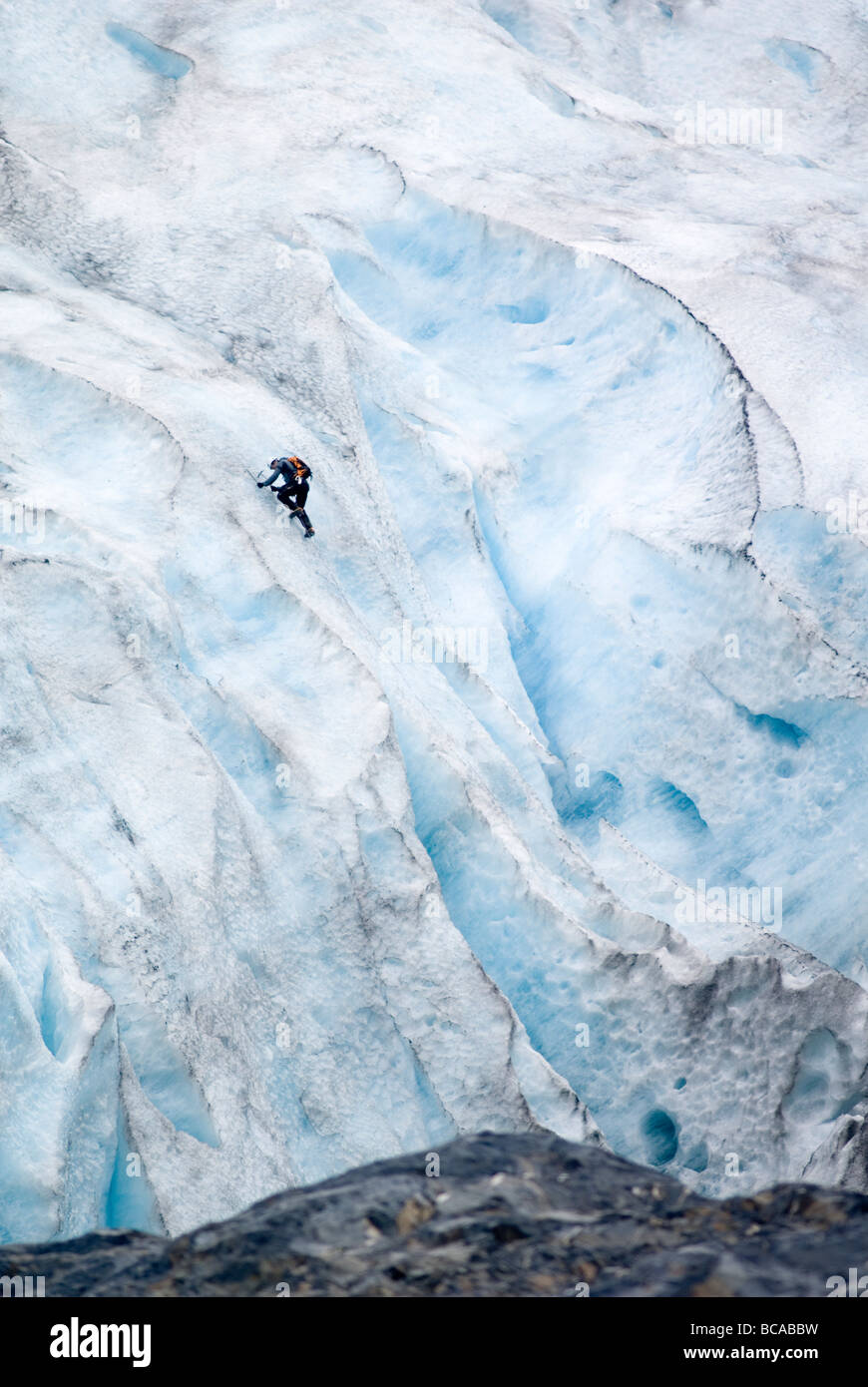 Ice climber on the blue ice of Exit Glacier Stock Photo Alamy