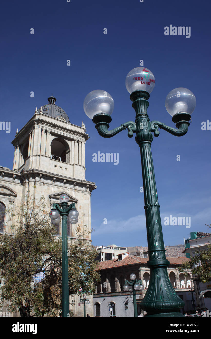 Symbol of 200th anniversary of the July 16th 1809 uprising in La Paz  on street lamp and cathedral tower, Plaza Murillo, La Paz , Bolivia Stock Photo