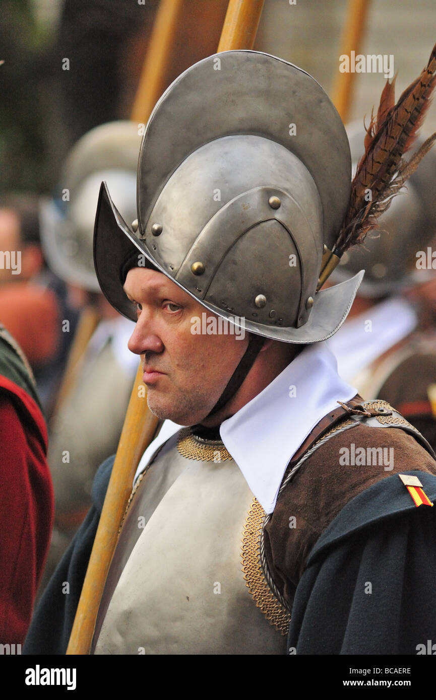 A grumpy pikeman in Geneva's annual Escalade Festival. Maybe feeling foolish because of the costume he is wearing. Stock Photo