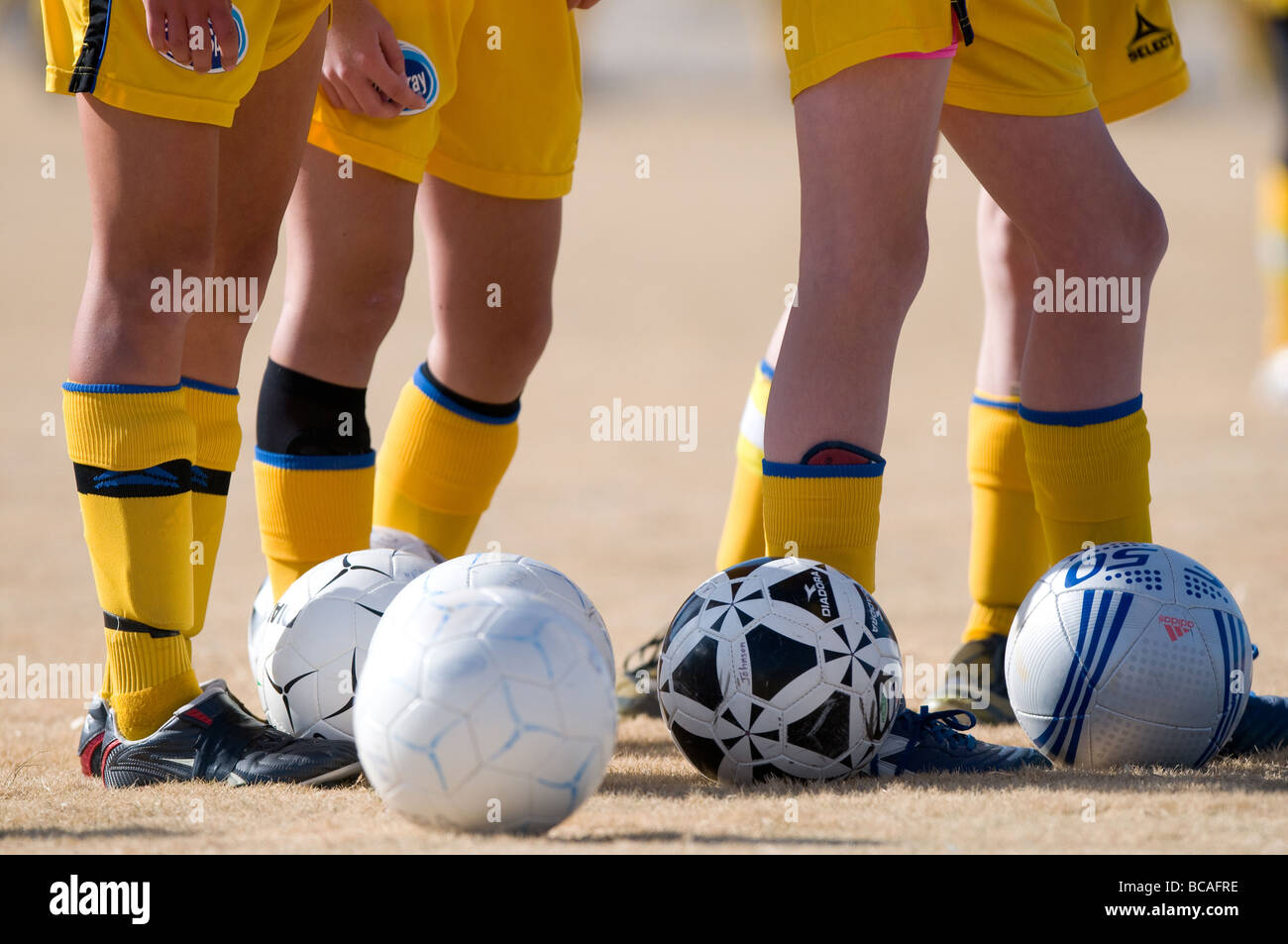 Female teenage soccer players wearing shin guards Stock Photo Alamy
