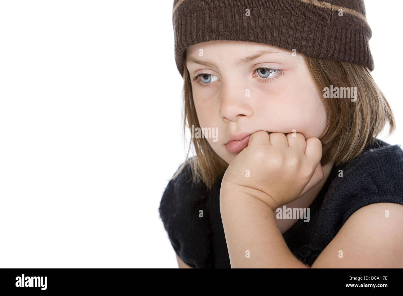 Shot of a Sweet Child Looking Sad Stock Photo
