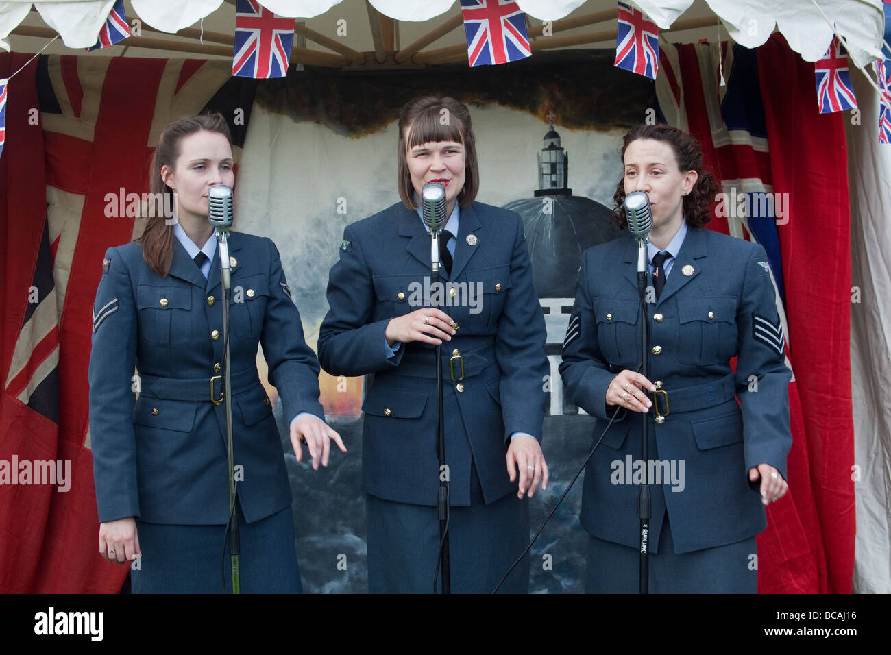 Forties girl singing group recreated at a wartime event at Richmond Castle North Yorkshire Stock Photo
