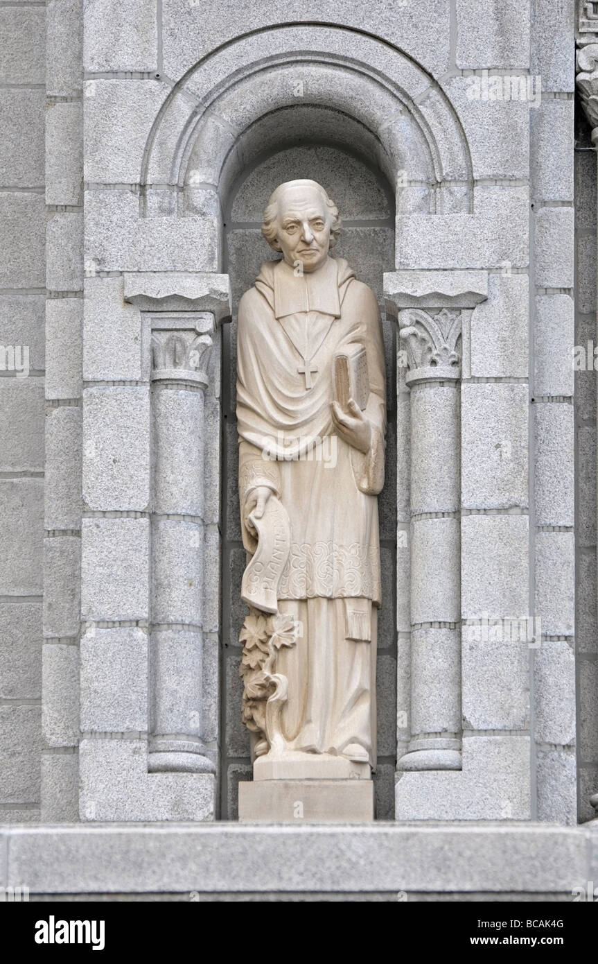 Statues around the facade of Sainte-Anne-de-Beaupré shrine, Quebec, Canada Stock Photo