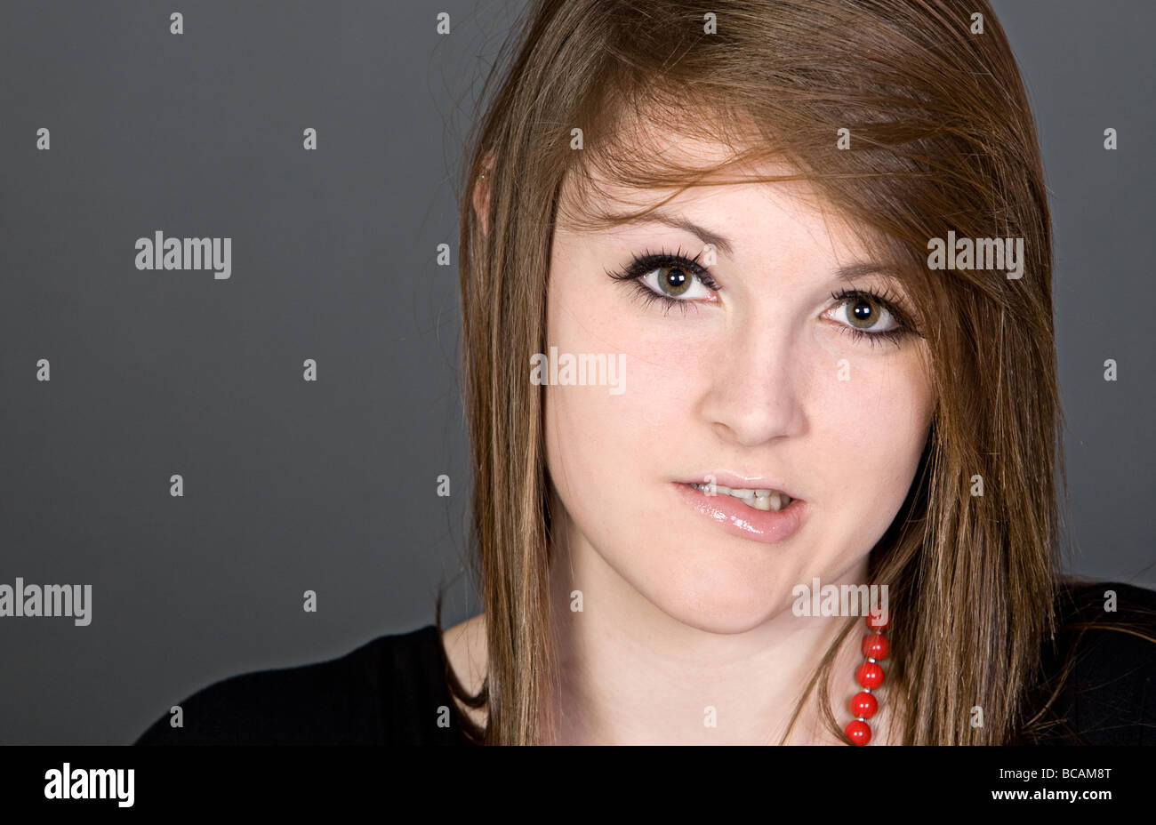 Biting lip anxious hi-res stock photography and images - Alamy