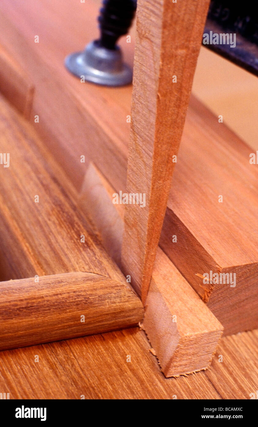 Wooden joiners with wedge detail of work Stock Photo Alamy