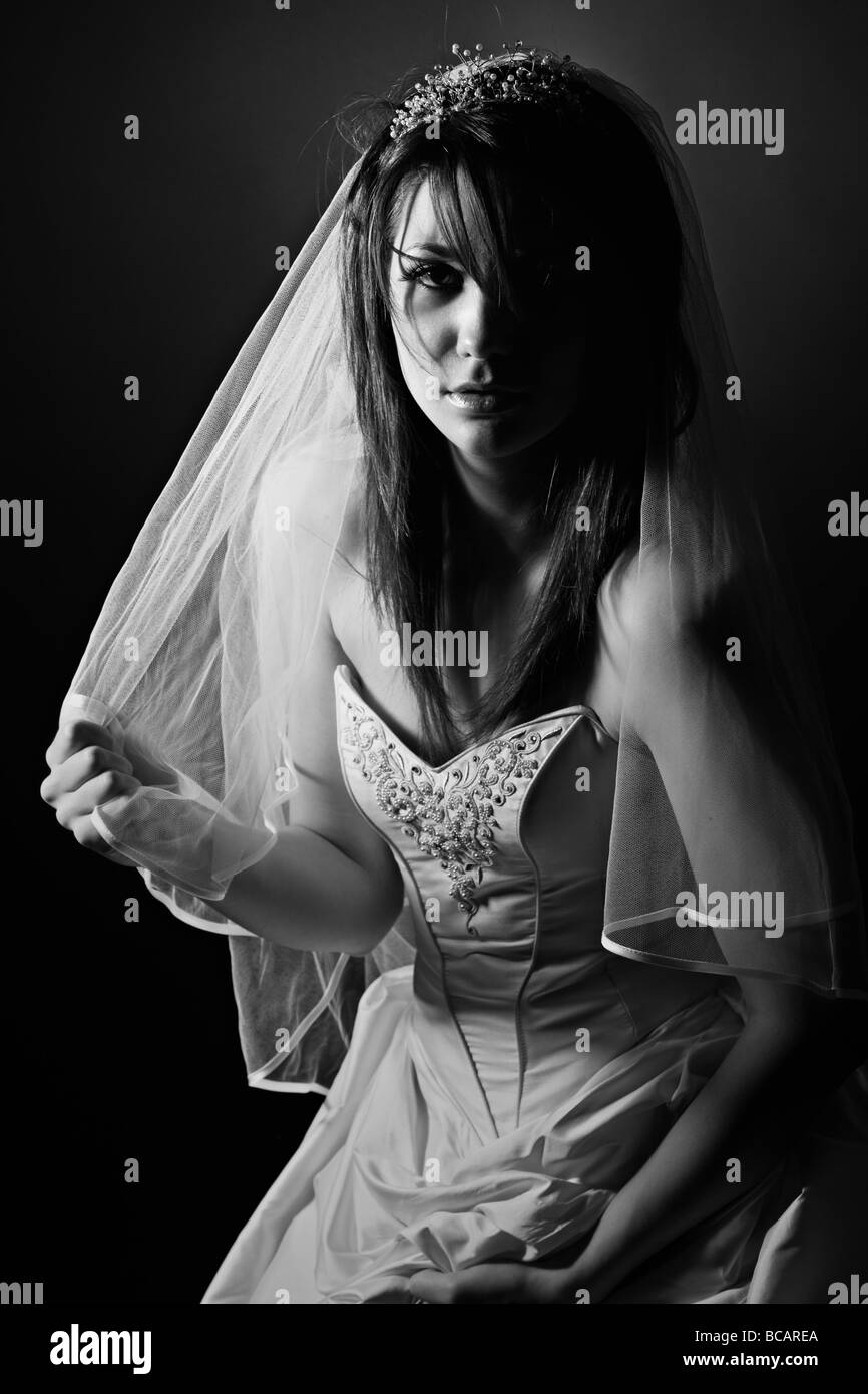 Black and White Shot of an Upset Teenage Bride Stock Photo