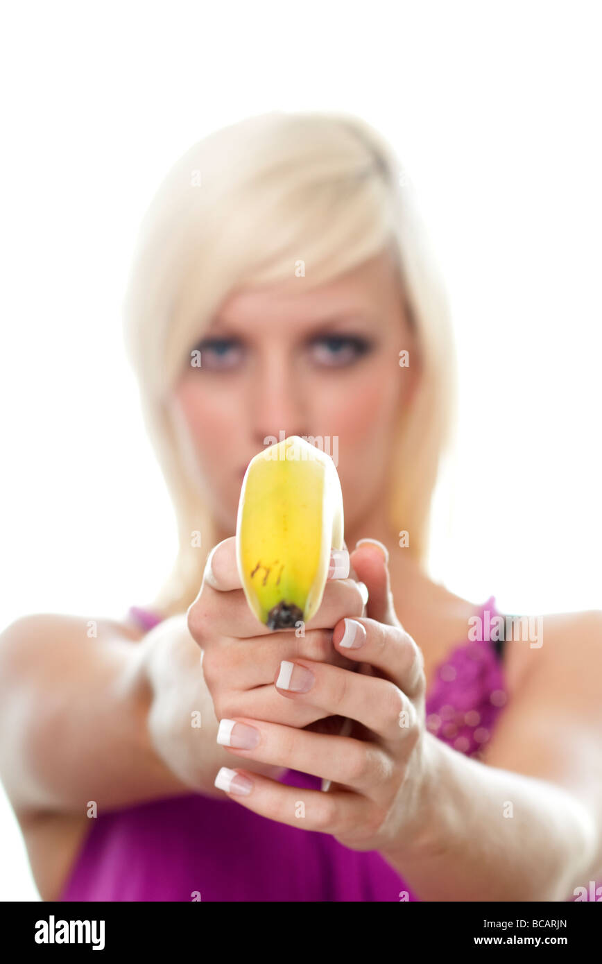 woman holding a banana Stock Photo