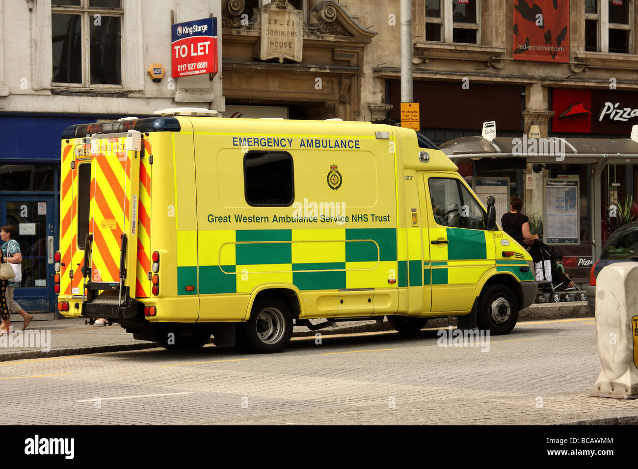 Bright yellow British ambulance Stock Photo