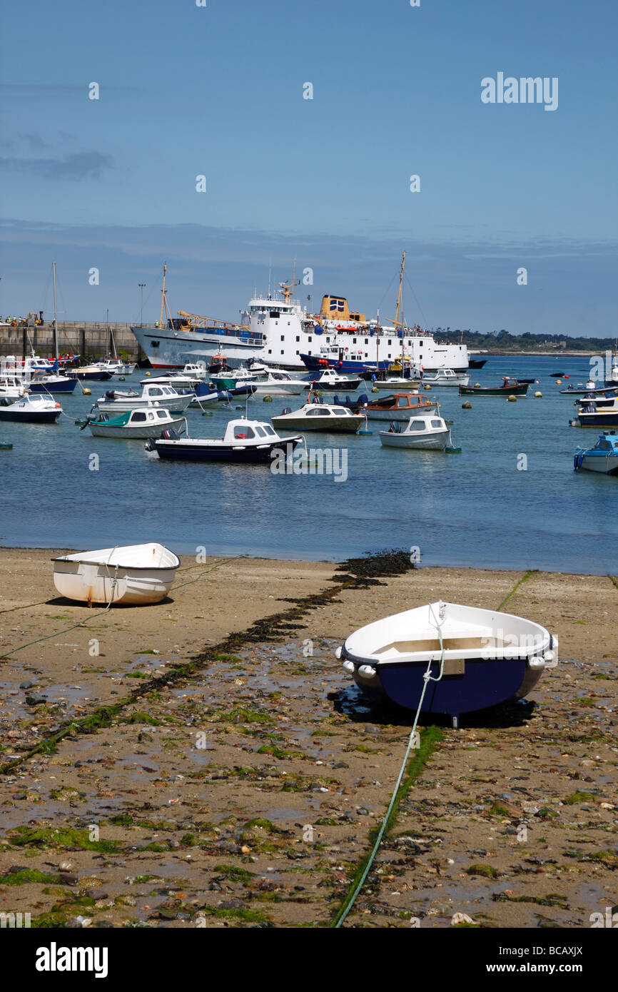 The Scillonian III and boats in St. Mary's harbour, Isles of Scilly, Cornwall UK. Stock Photo
