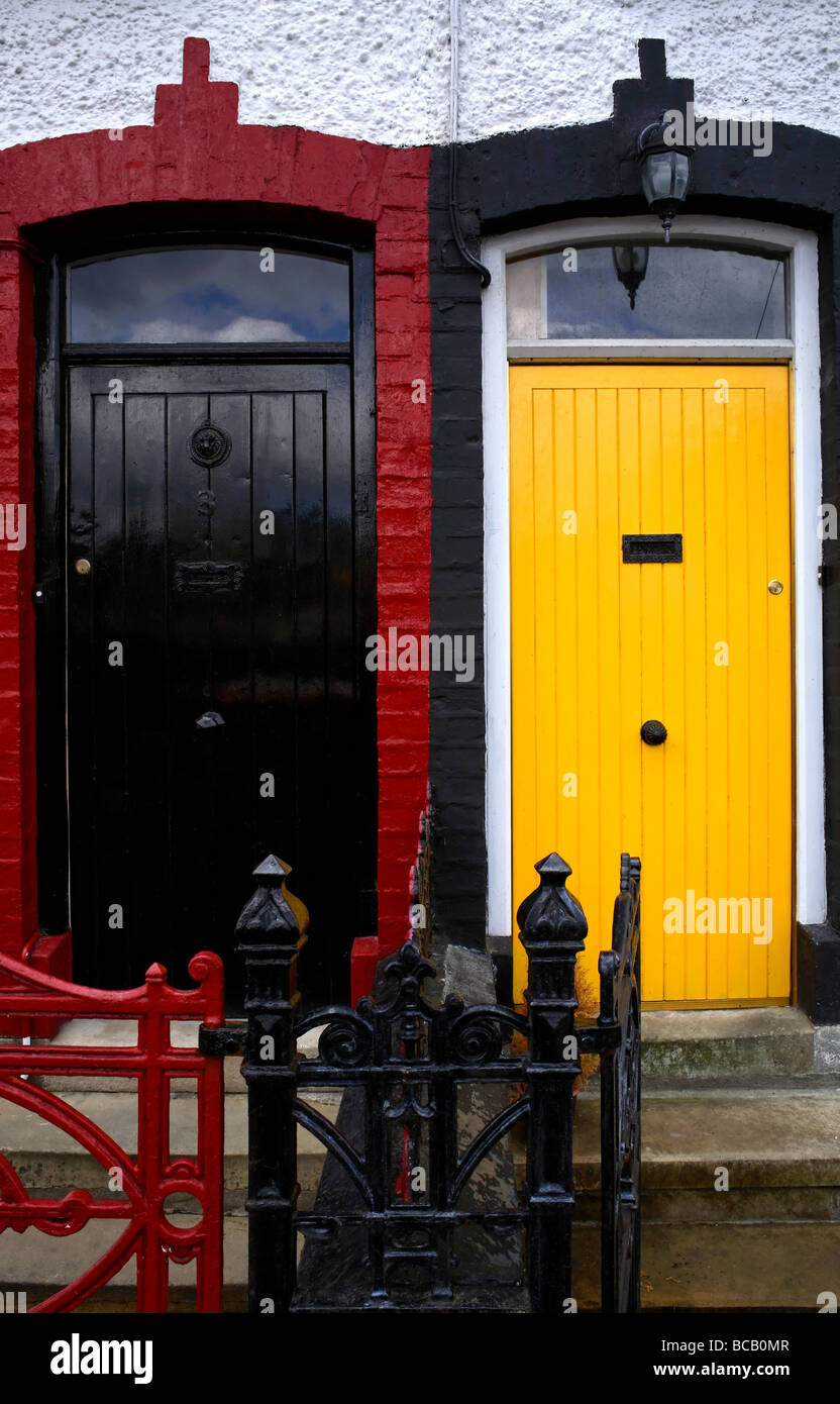 Black and Yelloe Front Entrance Doors County Donegal Ireland Stock