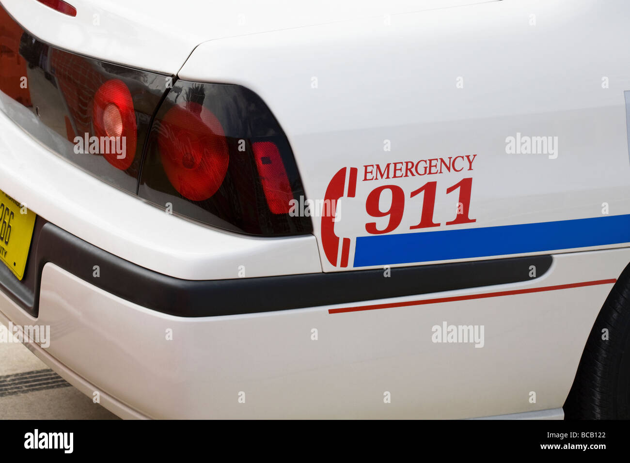 'Emergency 911' on the side of a police car Stock Photo