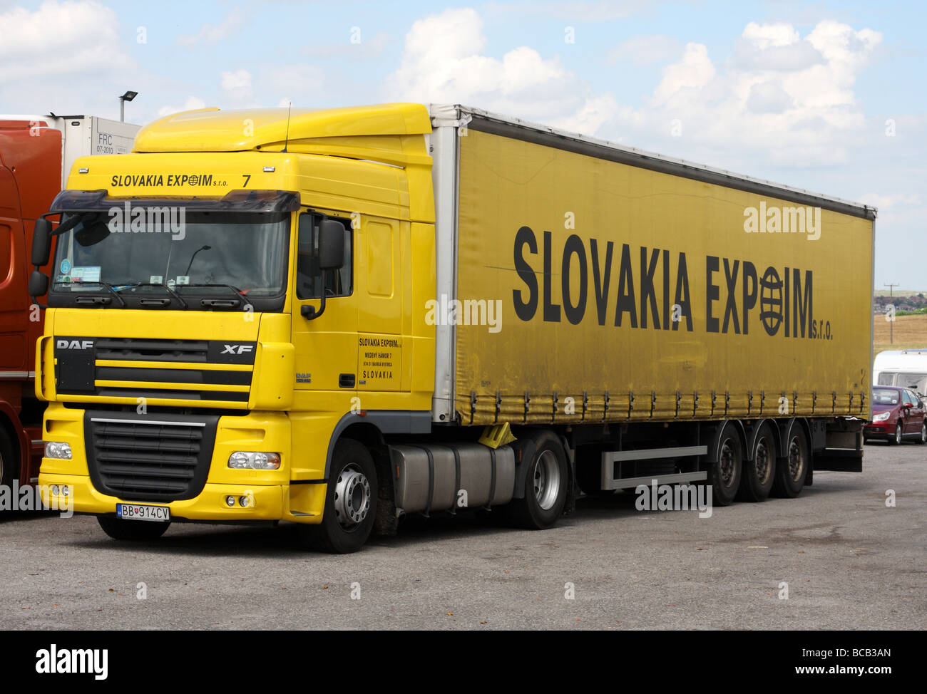 A Slovakian registered articulated lorry on a lorry park in the U.K. Stock Photo