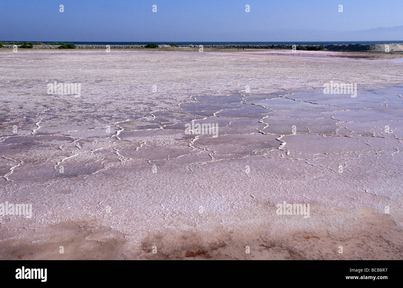Evaporating Salton Sea water leaves these polluted salt flats Stock