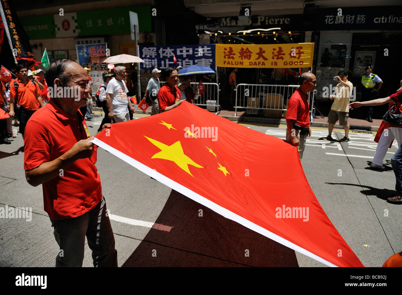 1 July is Hong Kong Special Administrative Region Establishment Day with parades for and demonstrations against the government. Stock Photo