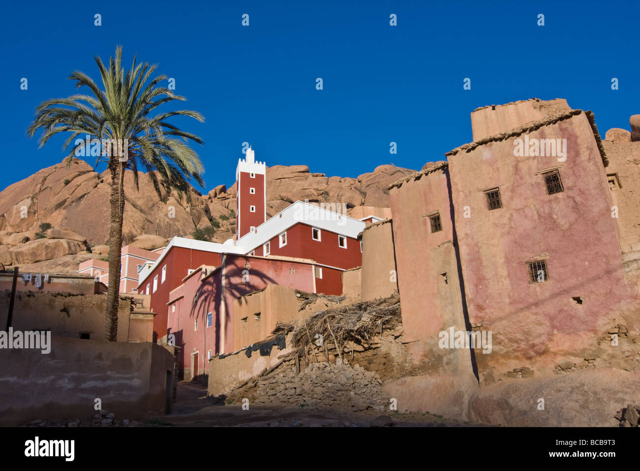 Red mosque in the Berber village of Adai, near Tafraoute, Morocco Stock Photo