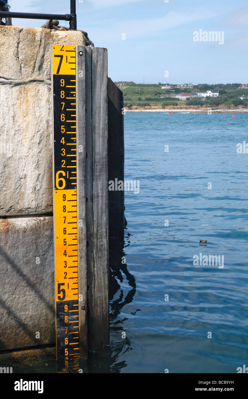 Sea tide depth measure on the quay in St. Mary's Isles of Scilly Stock  Photo - Alamy