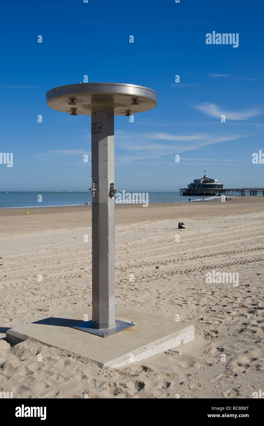 Blankenberge Shower on the beach Pier in the background Belgium North Sea  Coast Stock Photo - Alamy