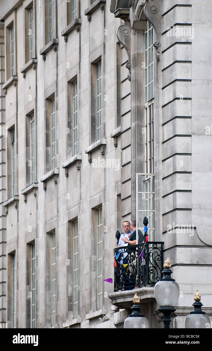 People standing on the balcony of a building in London.  Photo by Gordon Scammell Stock Photo