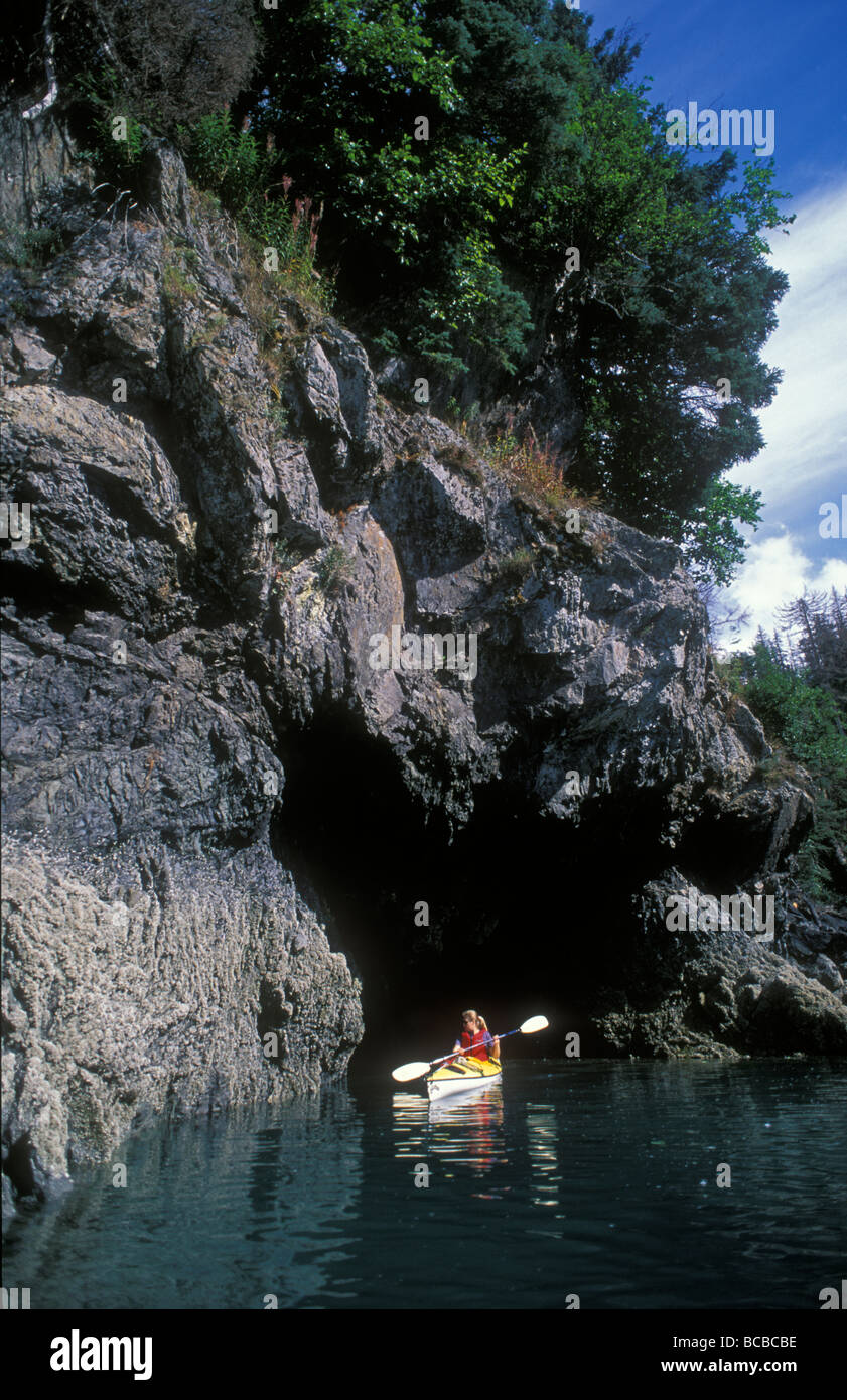 A woman kayaking in Halibut Cove Stock Photo Alamy
