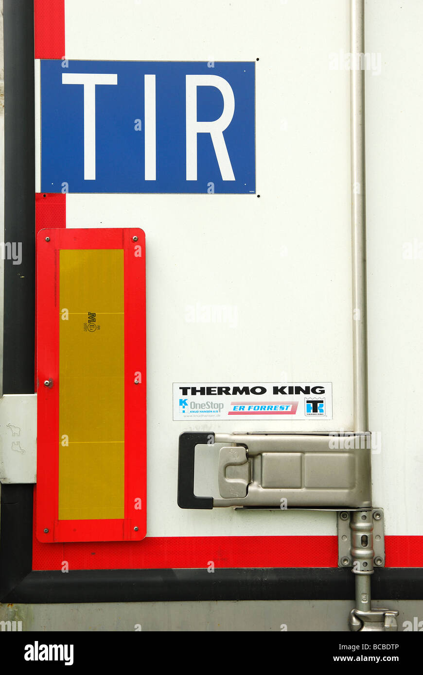 TIR Plate on the rear on long vehicle . Stock Photo