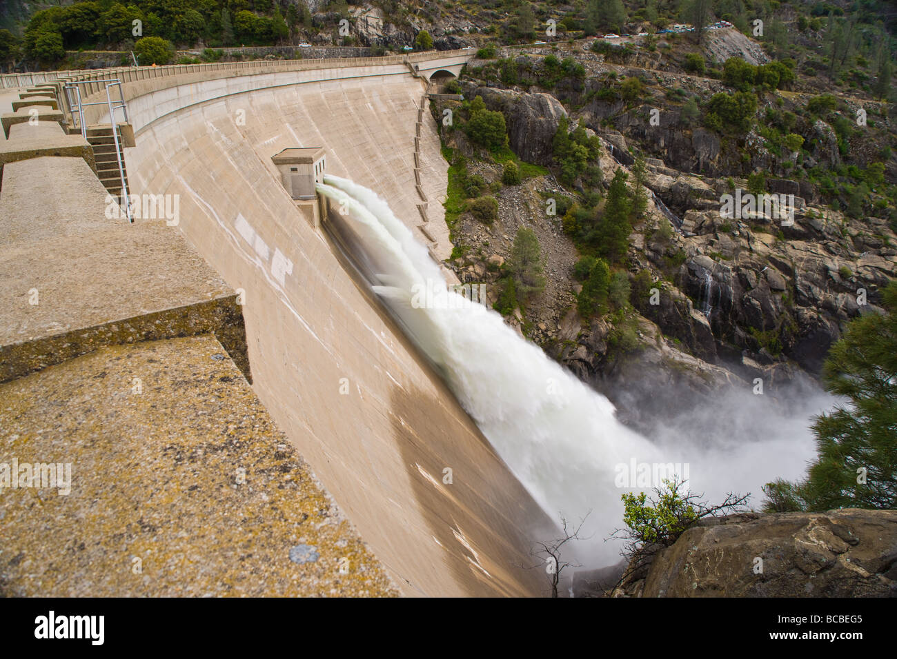 The O'Shaughnessy Dam in Yosemite National Park spills water through