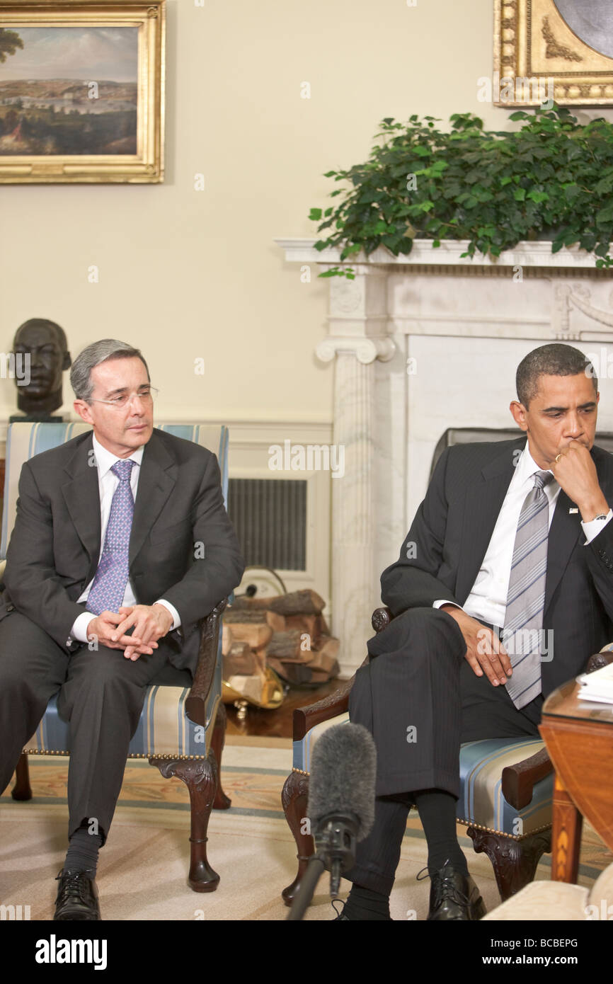 President Barack Obama meets with President Álvaro Uribe Velez of Columbia in the Oval Office of the White House. Stock Photo