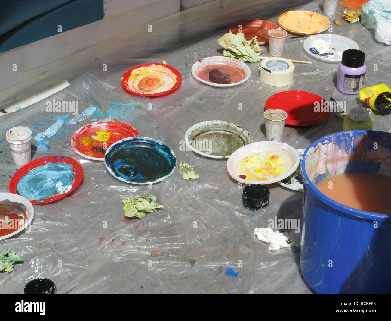 selection of paint palettes on floor in artist's studio Stock Photo Alamy