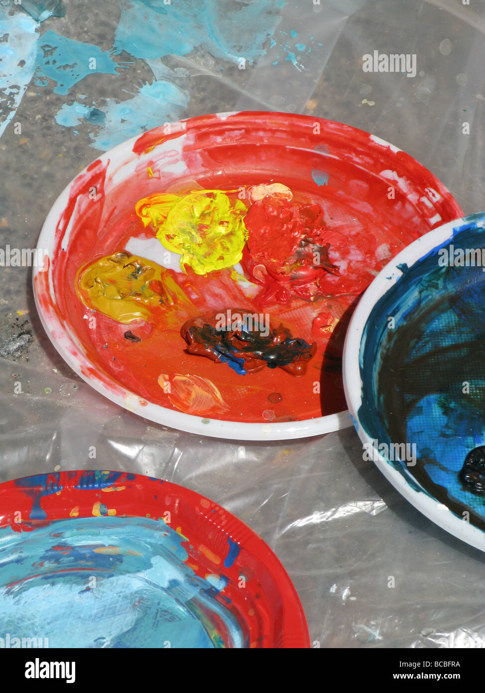 selection of paint palettes on floor in artist's studio Stock Photo Alamy