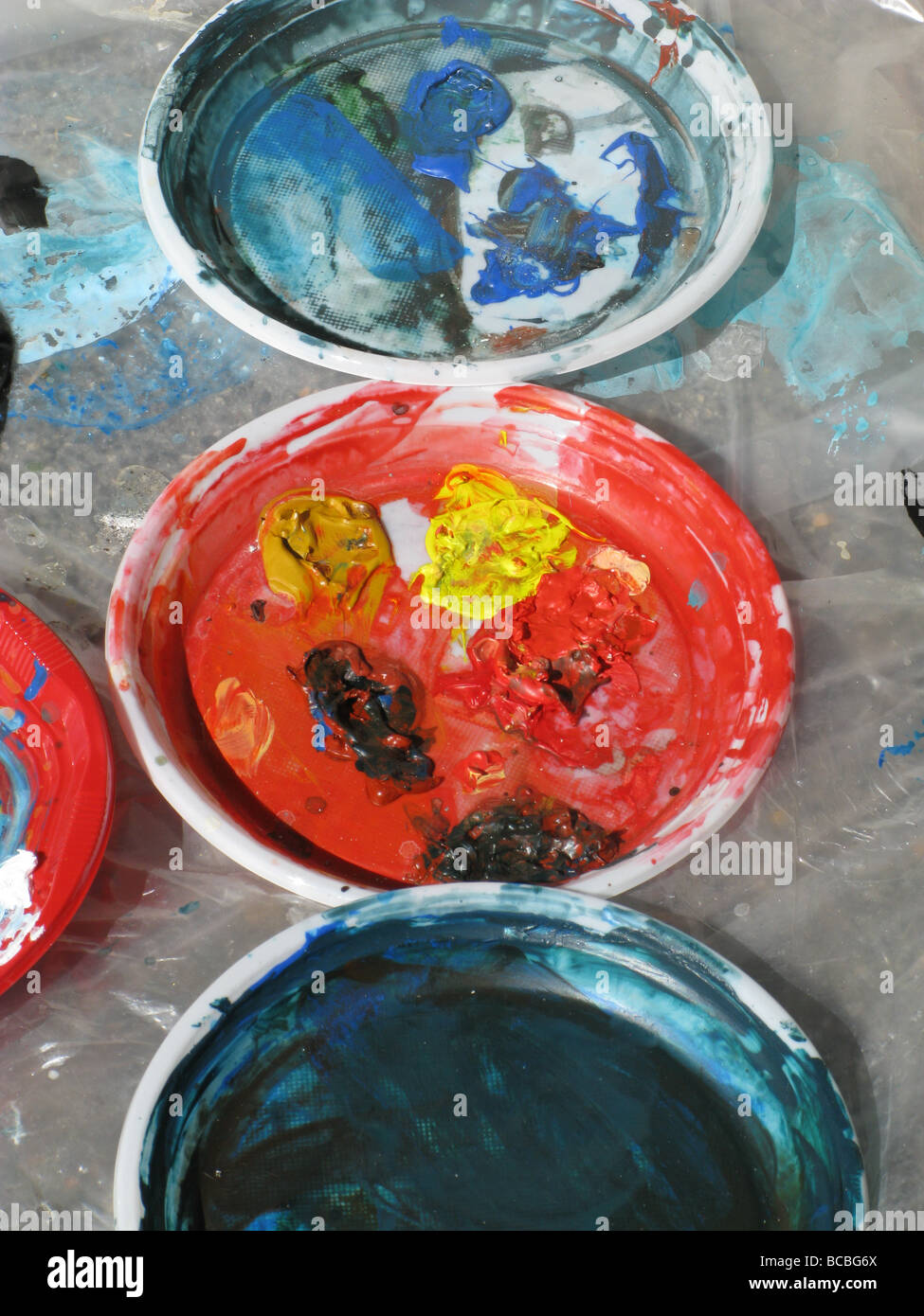 selection of paint palettes on floor in artist's studio Stock Photo Alamy