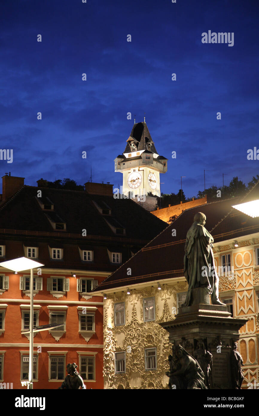 Night shot of the Graz Uhrturm as seen from the main square, Graz, Austria Stock Photo