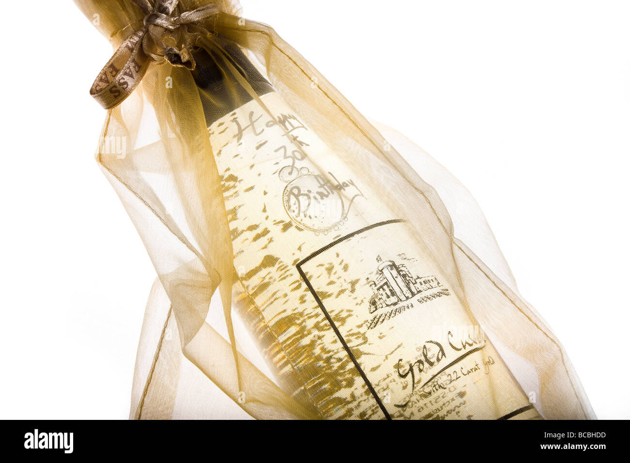 Designer Birthday celebration wine bottle bag detail containing 22 carat gold leaf in net bag Stock Photo