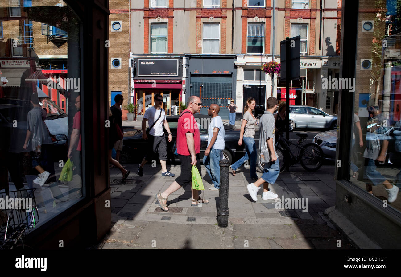 Shoppers on Upper Street, Islington, London. Stock Photo