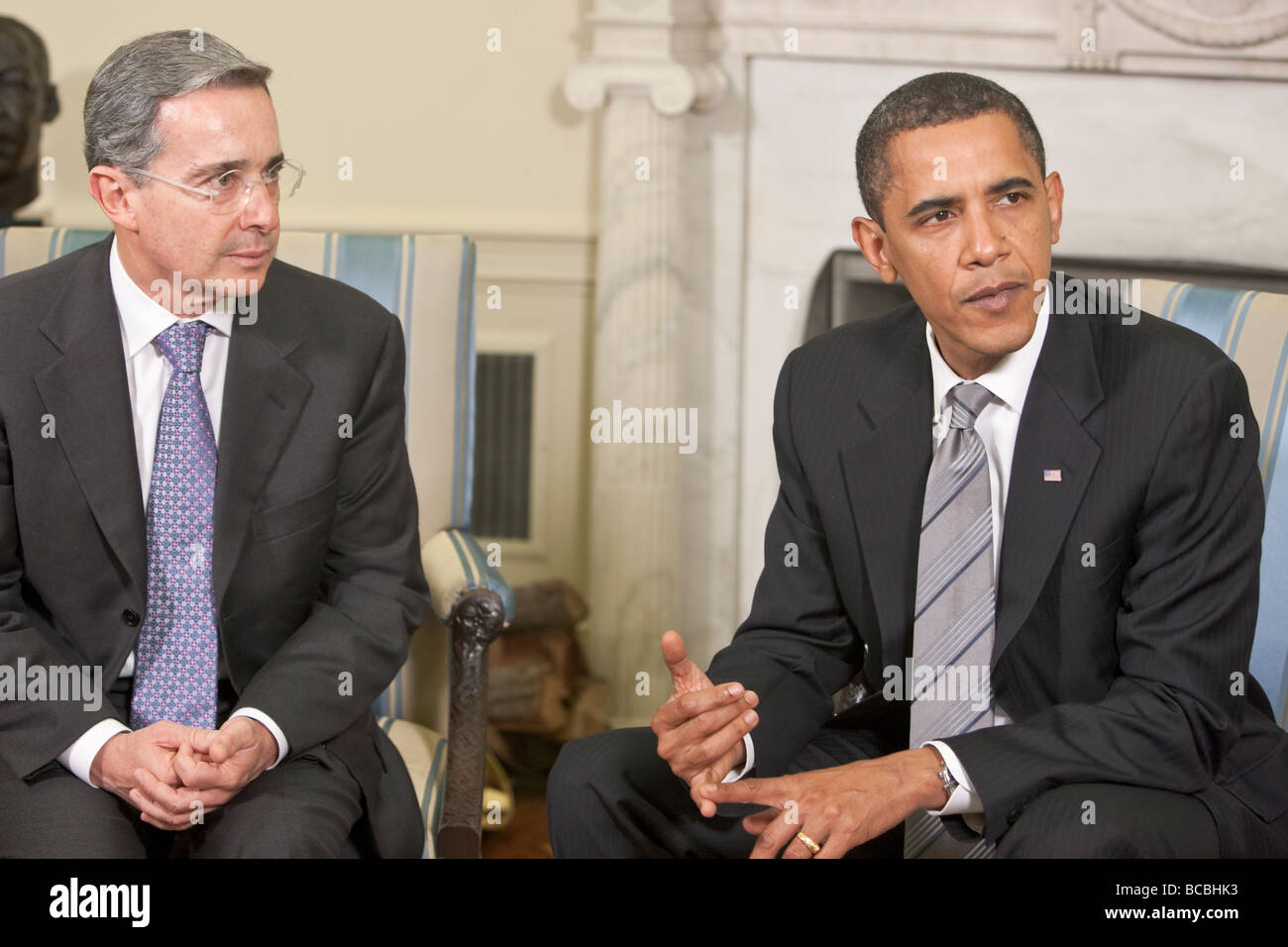 President Barack Obama meets with President Álvaro Uribe Velez of Columbia in the Oval Office of the White House. Stock Photo