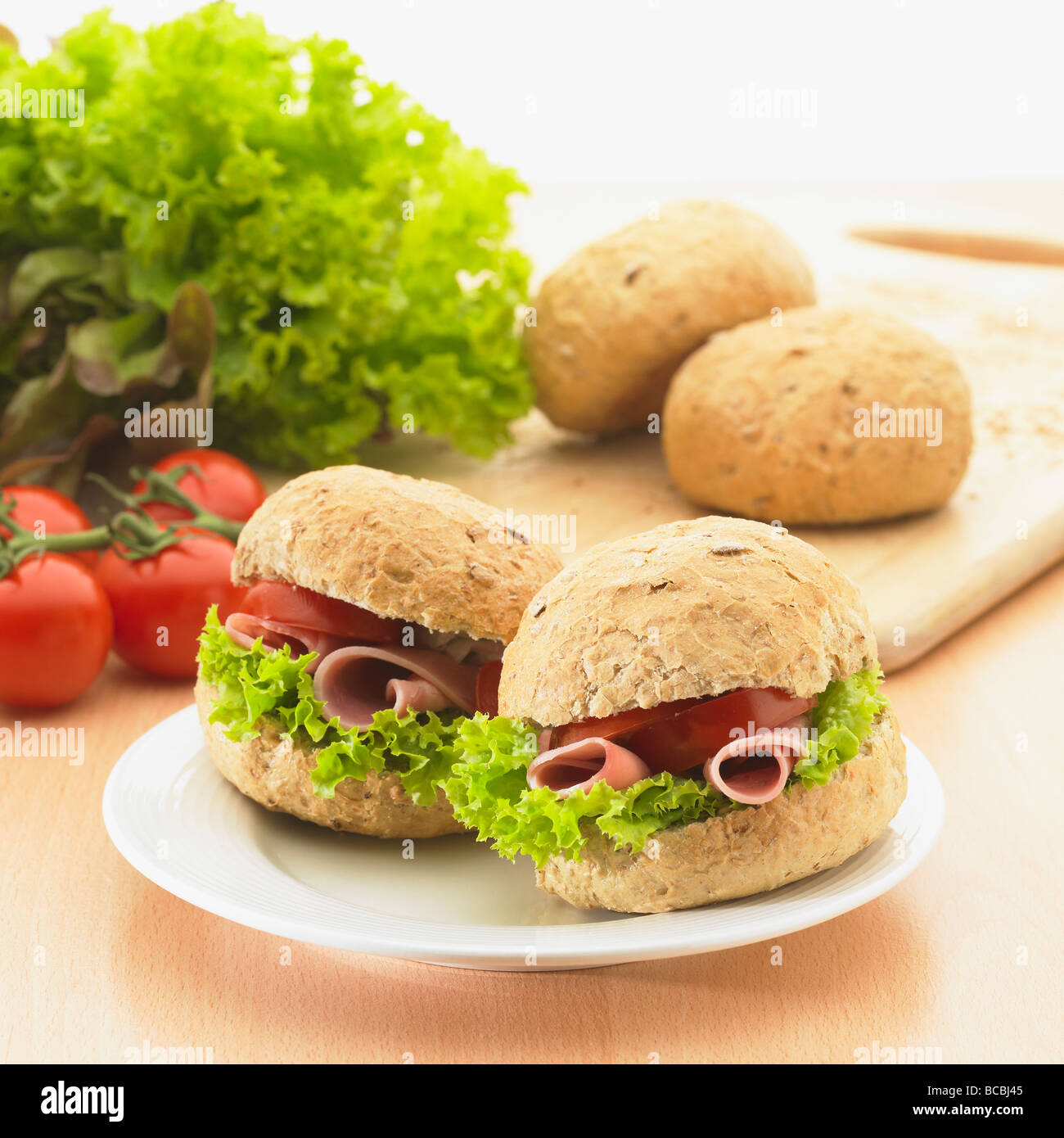 Healthy wholemeal roll sandwich snack. Stock Photo