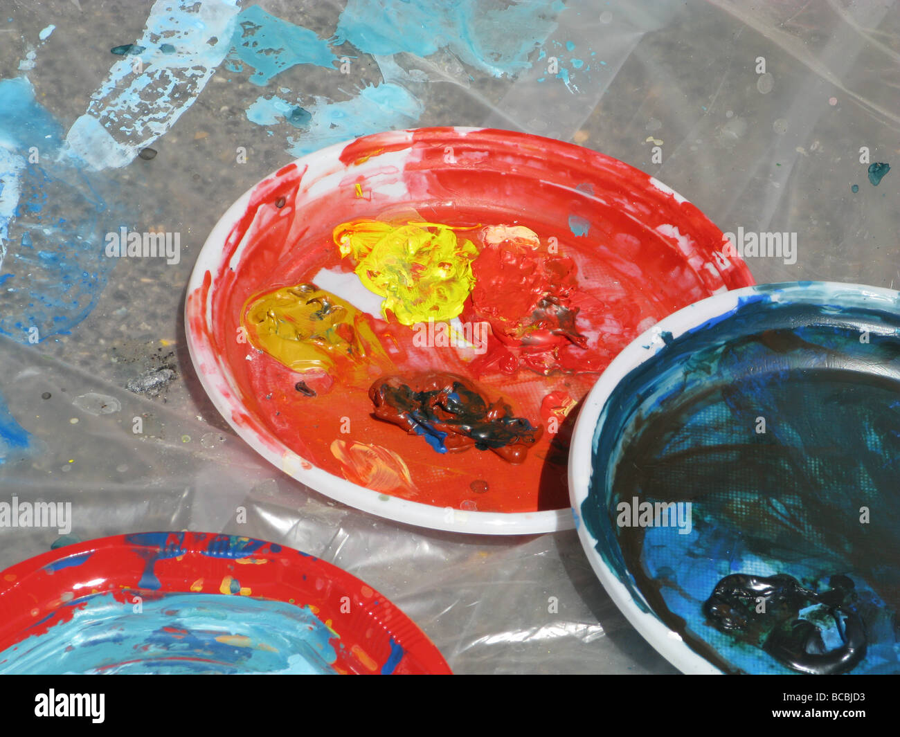 selection of paint palettes on floor in artist's studio Stock Photo Alamy