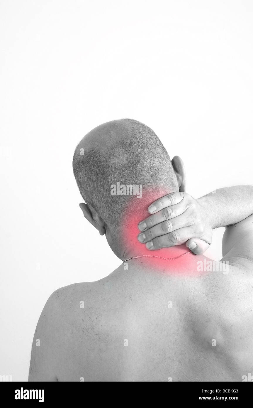 a man suffering from stiff neck Stock Photo