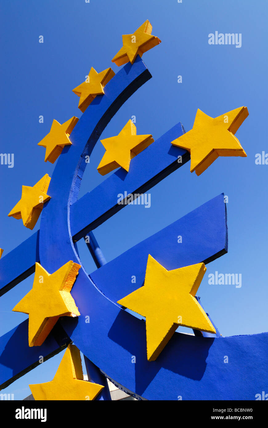 Big logo of European € (euro) currency on blue sky Stock Photo