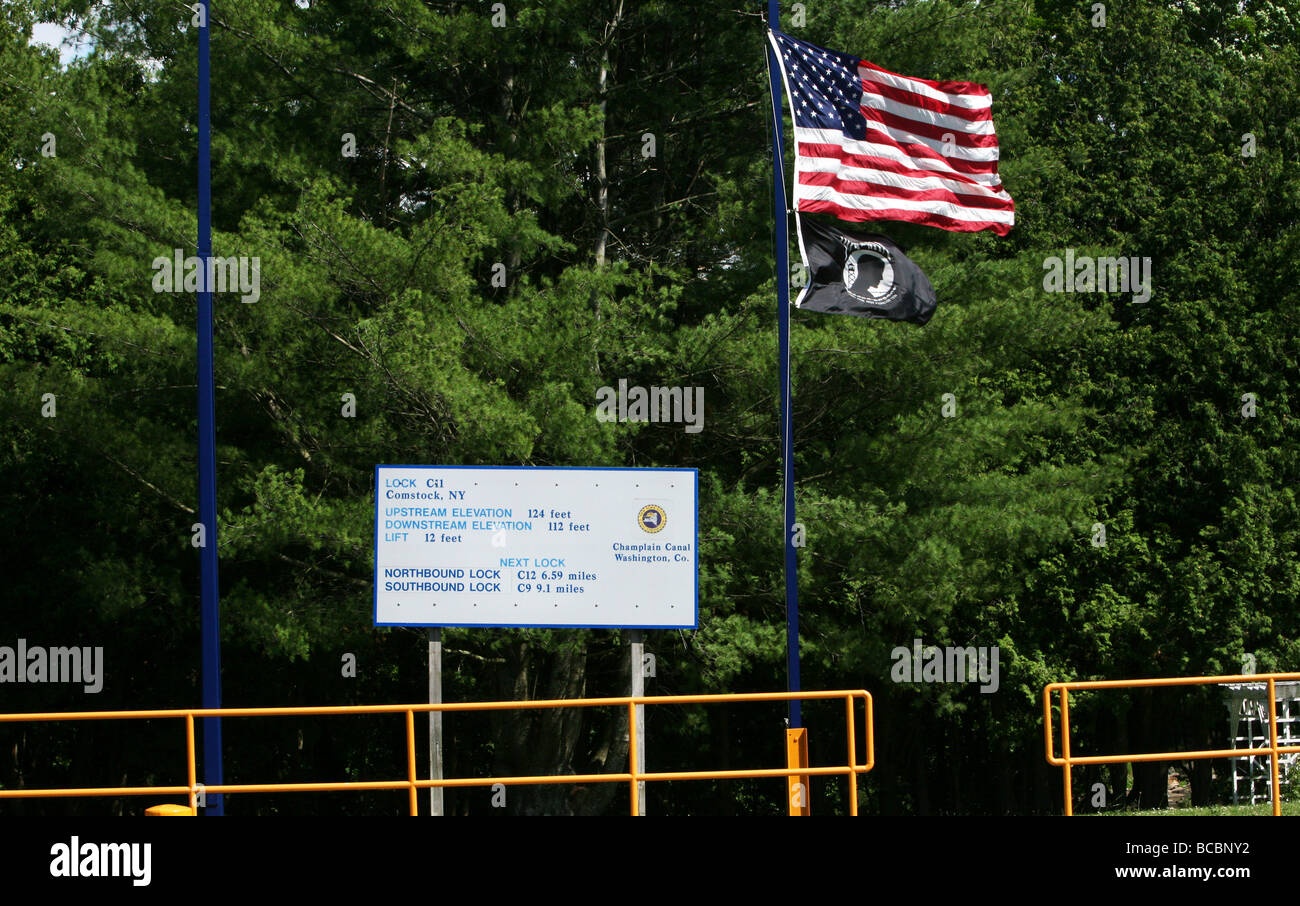 Signs marking Lock 11 on the Champlain Canal in Whitehall New York. Sign American Flag Mia Flag