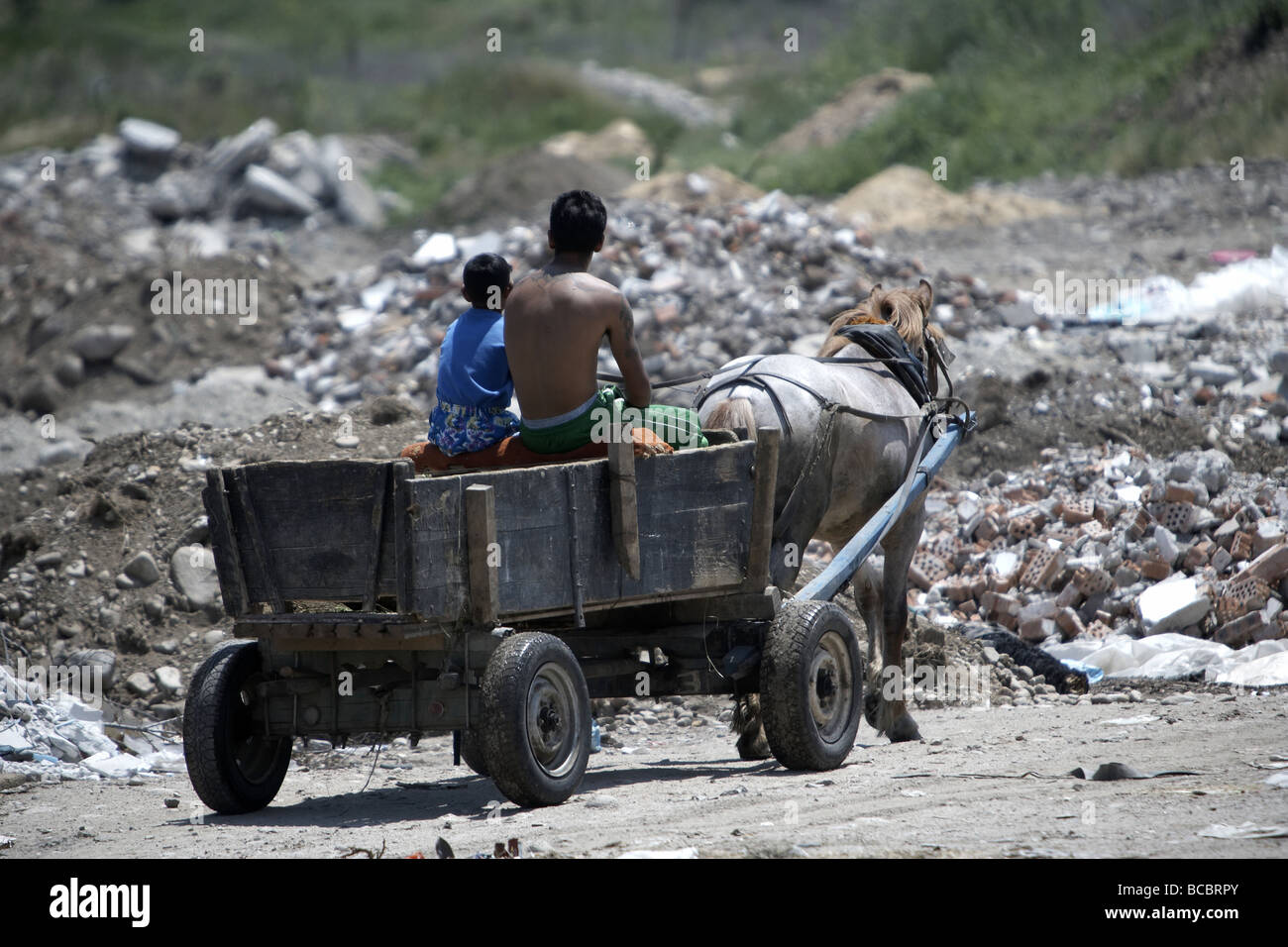 Adults and children scavenging for rubbish using a horse and cart Samokov Bulgaria Stock Photo
